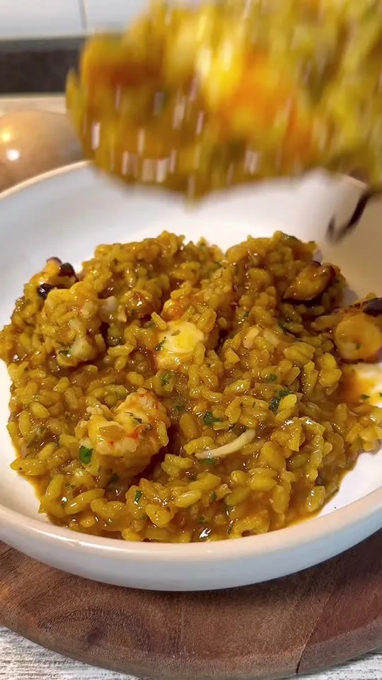 Arroz meloso de pulpo y gambones