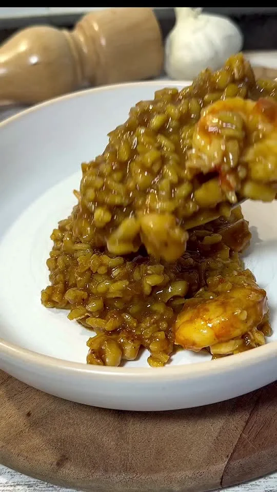 Arroz meloso de gambones al ajillo